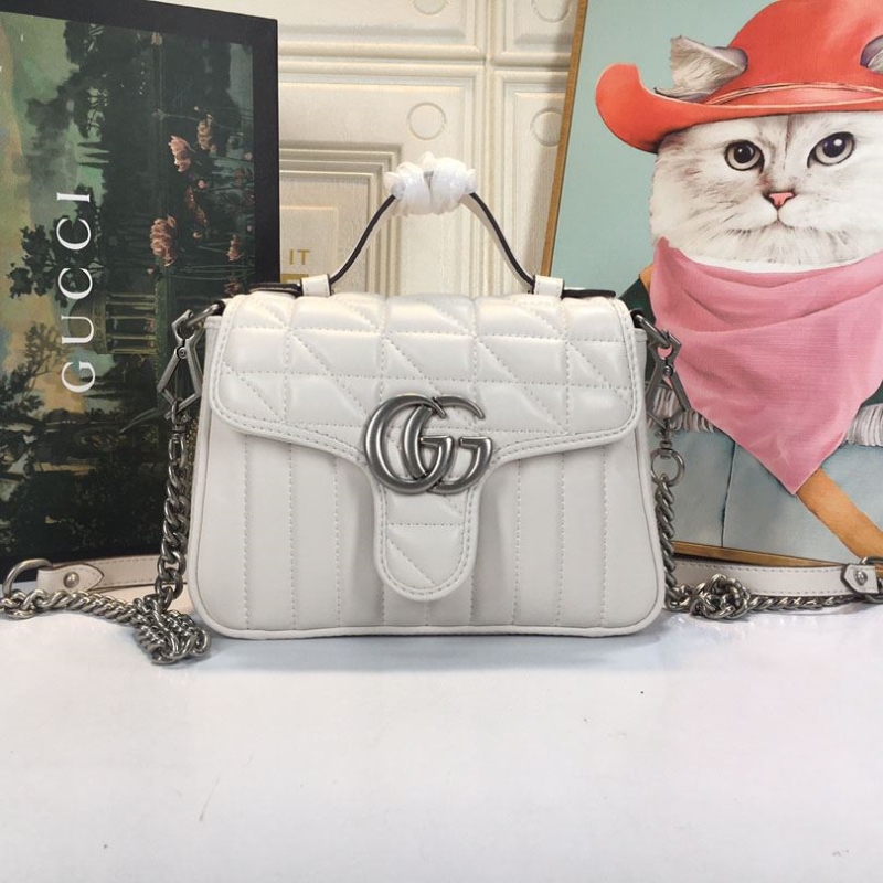 G*u*i top handle bags